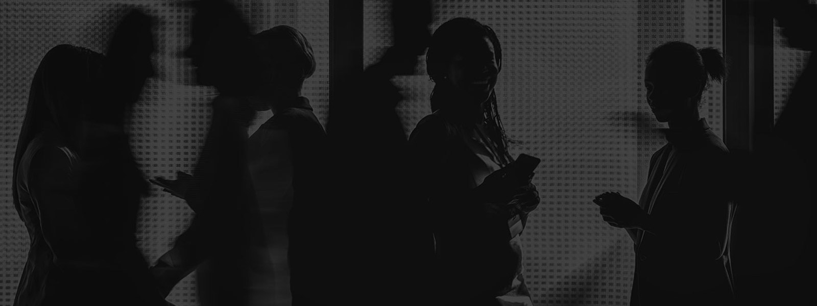 White and black image of four ladies