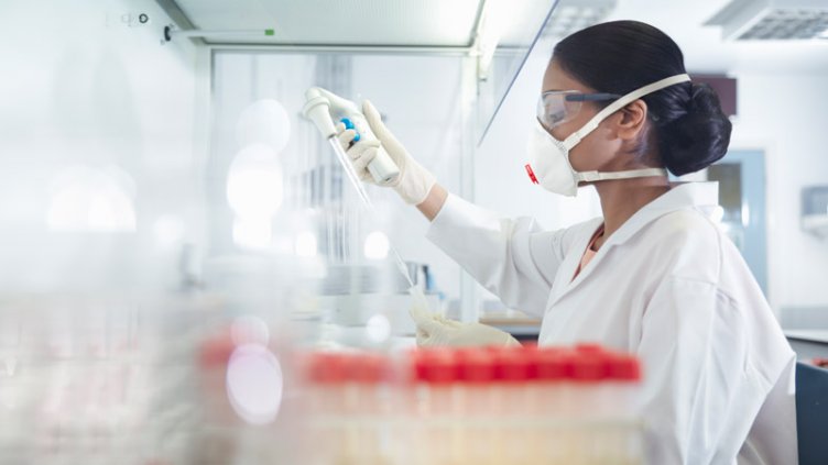 A female doctor making some tests in laboratory