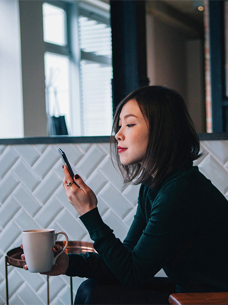 Portrait of young confident young businesswoman in a loft style work environment.