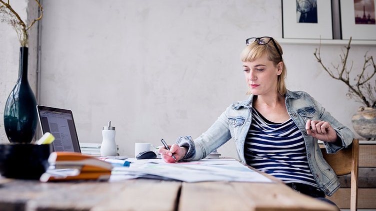 Women working on her project from home	