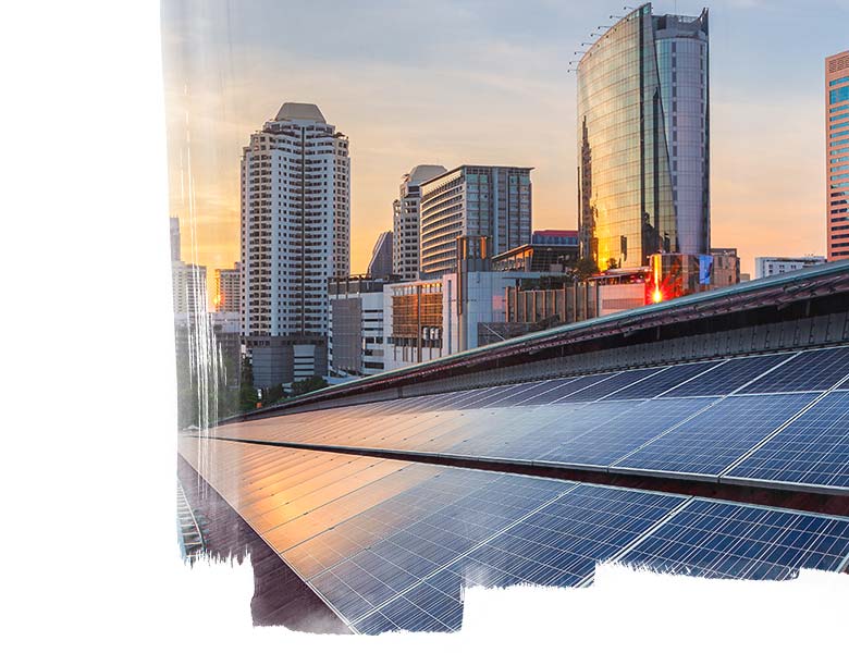 Solar Panel Photovoltaic installation on a Roof of factory, sunny blue sky background