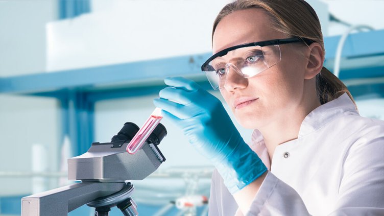 Picture of a doctor performing some test in a lab