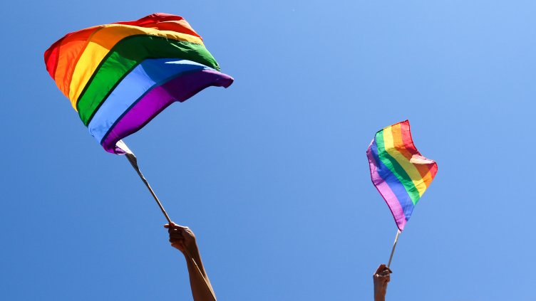 Waving rainbow flags