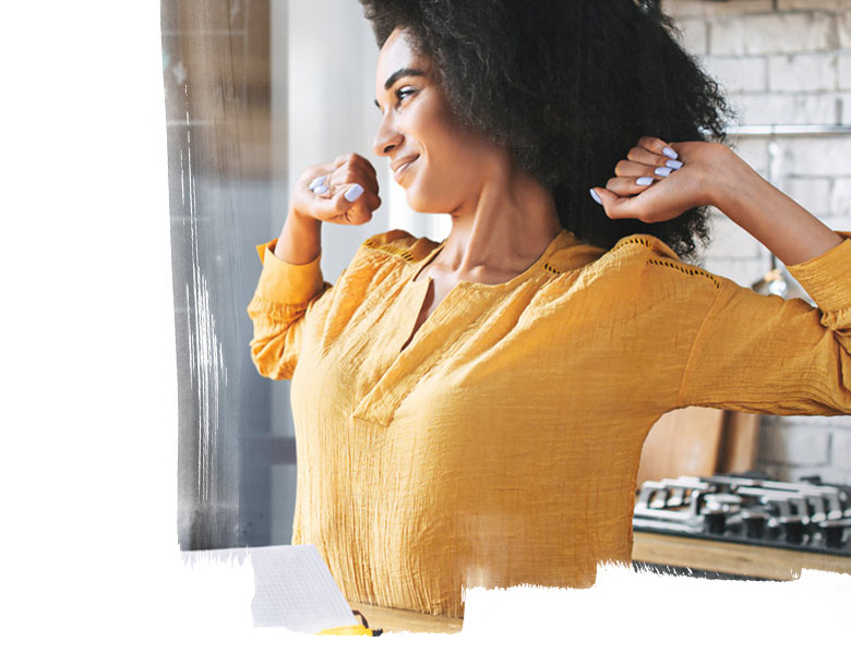 Woman smiling and relaxing after her quarterly board meeting