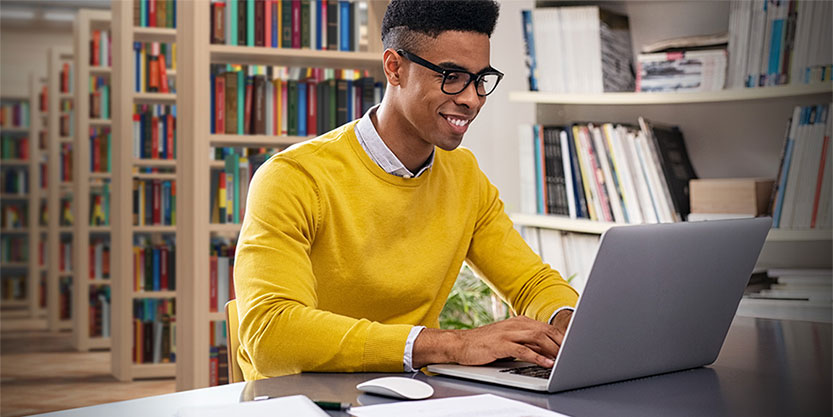 a man using his laptop