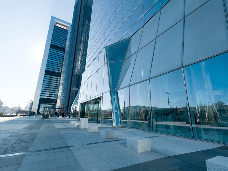 Entrance view of modern high rise office building workplace